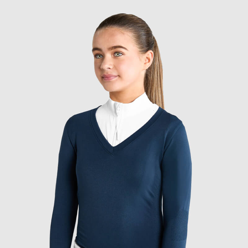 Young woman in a ponytail modeling Aztec Diamond YR Show Sweater Navy with seamless technology.