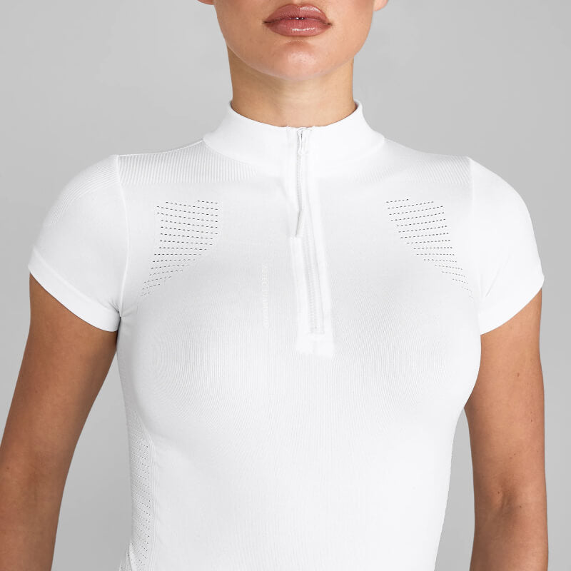 Woman in an Aztec Diamond 3D Woven Show Shirt White with black belt, against a gray background.