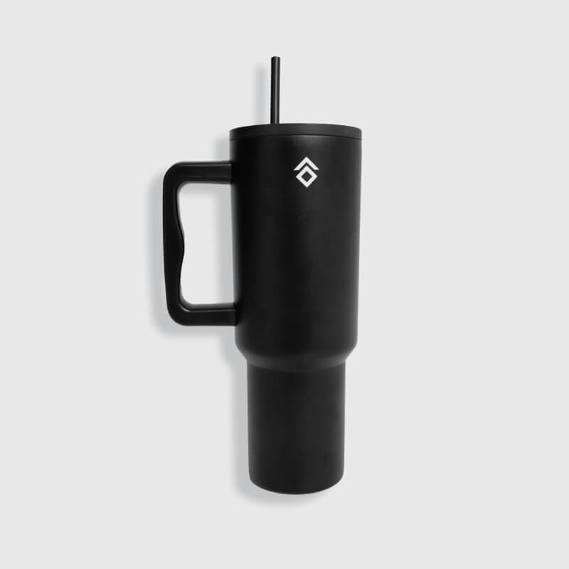 Aztec Diamond Tumbler Black by Aztec Diamond with handle, straw, and text on gray background.