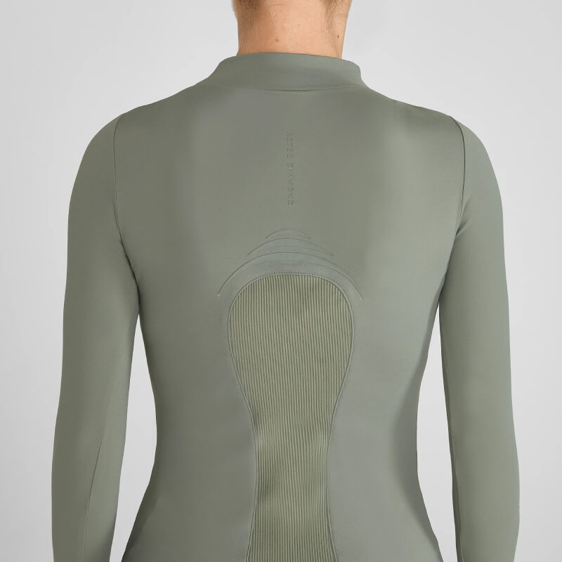 Wearing an Aztec Diamond Define Baselayer Sage, crafted from buttery sports fabric, back view.