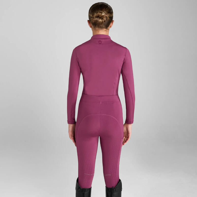 Woman in Aztec Diamond YR Full Seat Leggings Raspberry, seen from behind against a plain background.