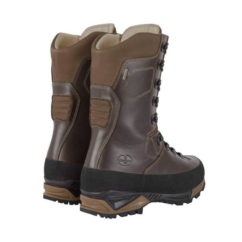 Le Chameau Mouflon 2.0 Extreme 12'' brown leather boots with black Vibram soles, rear view.