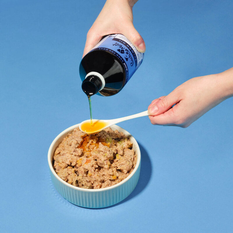 Pooch & Mutt Salmon Oil 500ml adds Omega 3 to your dog's food when poured over meals.