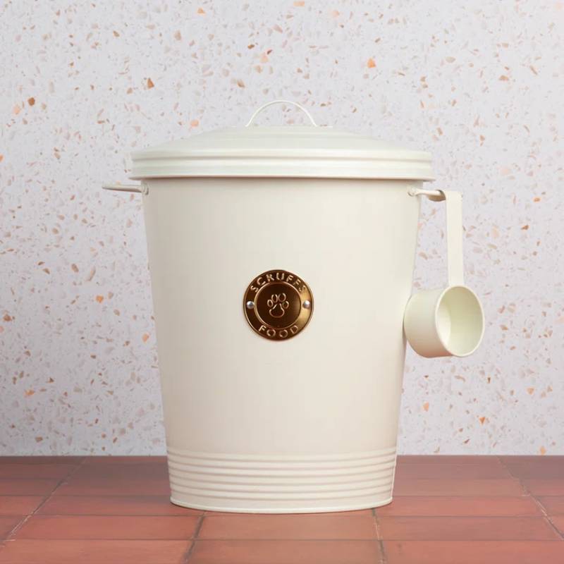 Scruffs Cantina Cream 4Ltr Pet Food Canister & Scoop shown against a speckled wall.