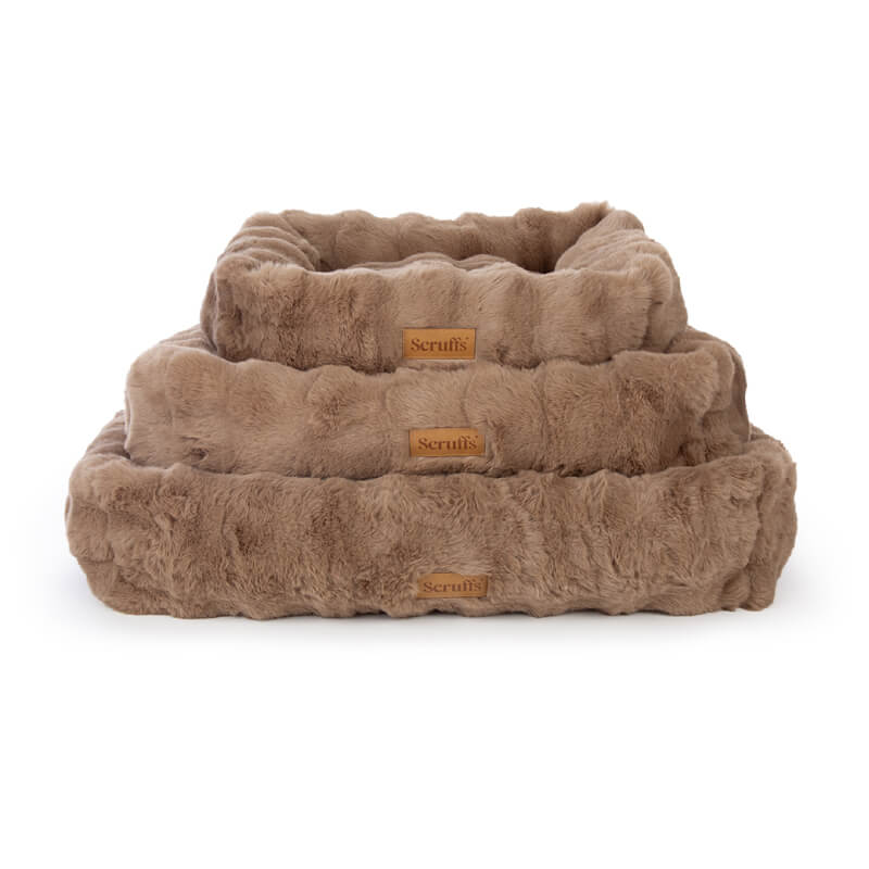 Three stacked Scruffs Alpine Box Bed Taupe, each with labels and a soft faux fur finish.