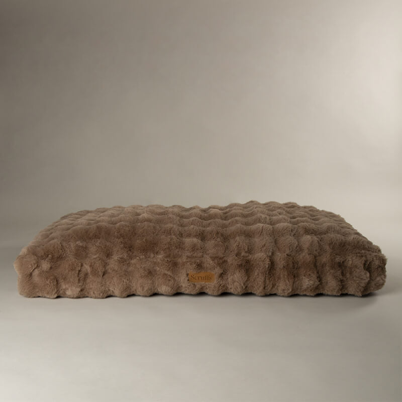 The Scruffs Alpine Mattress Taupe is a rectangular, plush, machine-washable dog bed.