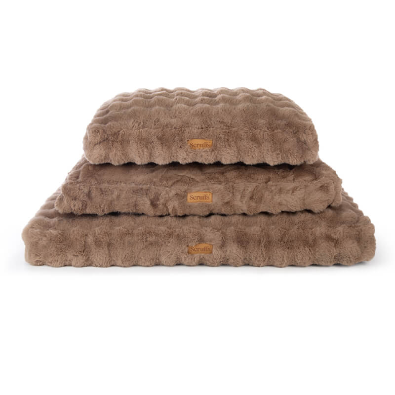 Three stacked Scruffs Alpine Mattress Taupe beds with wavy texture and tan labels.