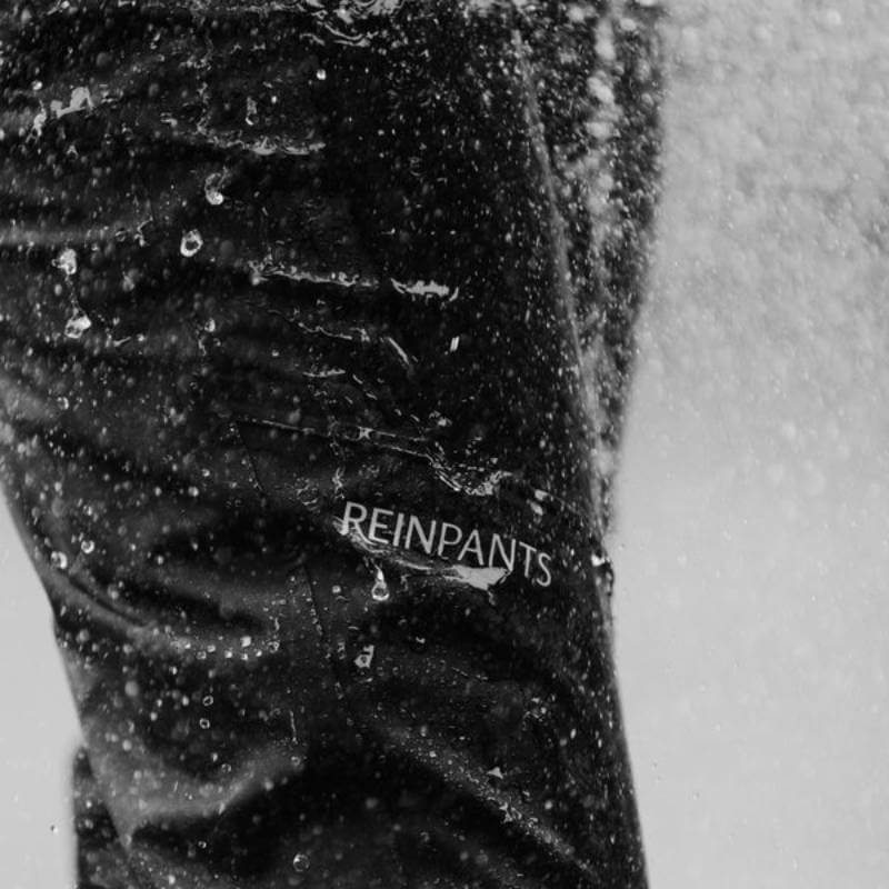 Lightweight Reinpants Lite Black by Reinwear with REINPANTS logo on the leg.