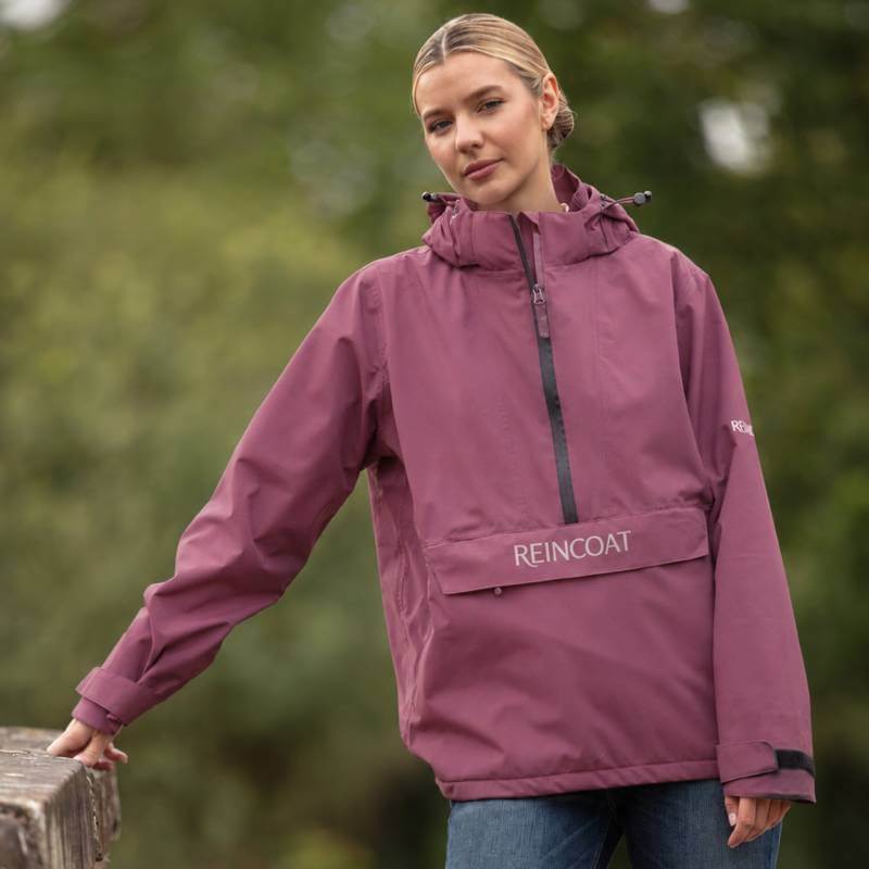Reinwear Reincoat Smock Lite Adult Bloom in mauve, REINCOAT pocket detail, outdoor style.