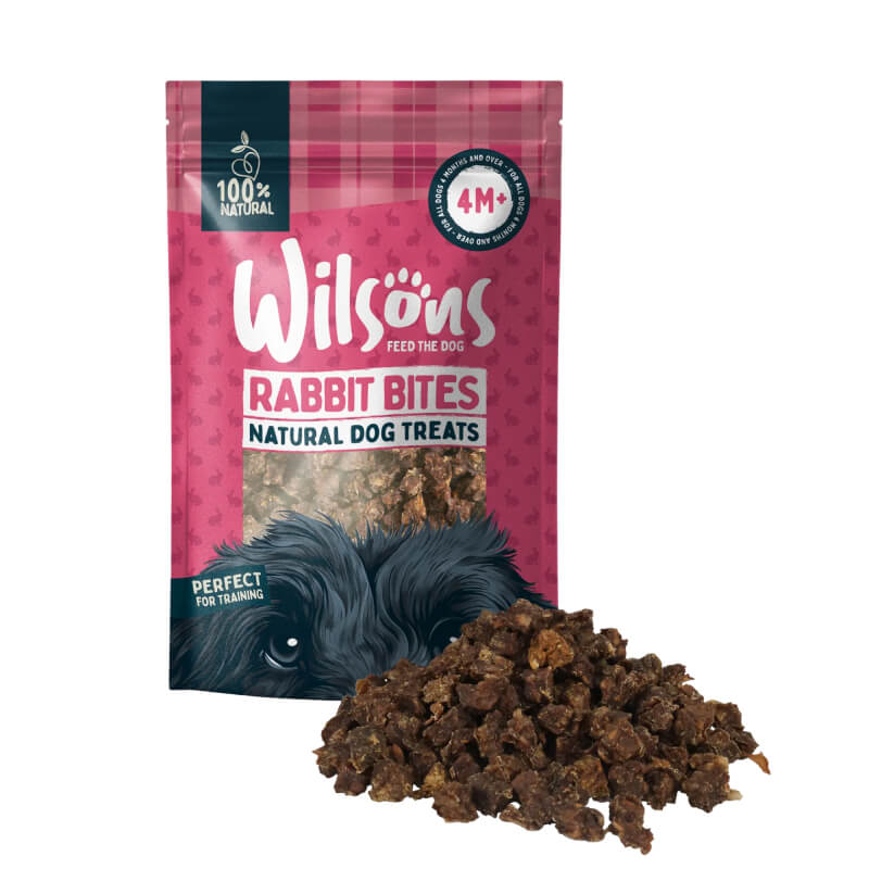 Wilsons Natural Dog Treats Rabbit Bites 200g bag with treats displayed in front of the package.