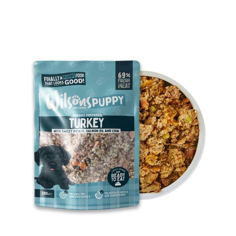 Wilsons Premium Fresh Puppy Food Turkey, 8x380g packs, features a black puppy on the pouch.