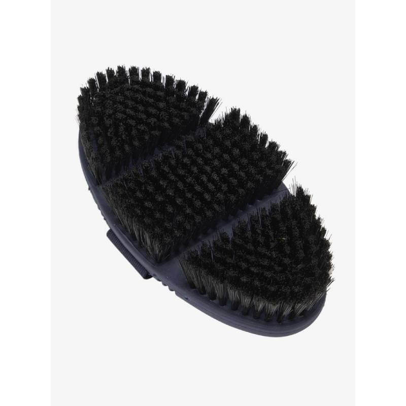 LeMieux Flexi Soft Body Brush Navy with dense synthetic bristles and an oval shape.