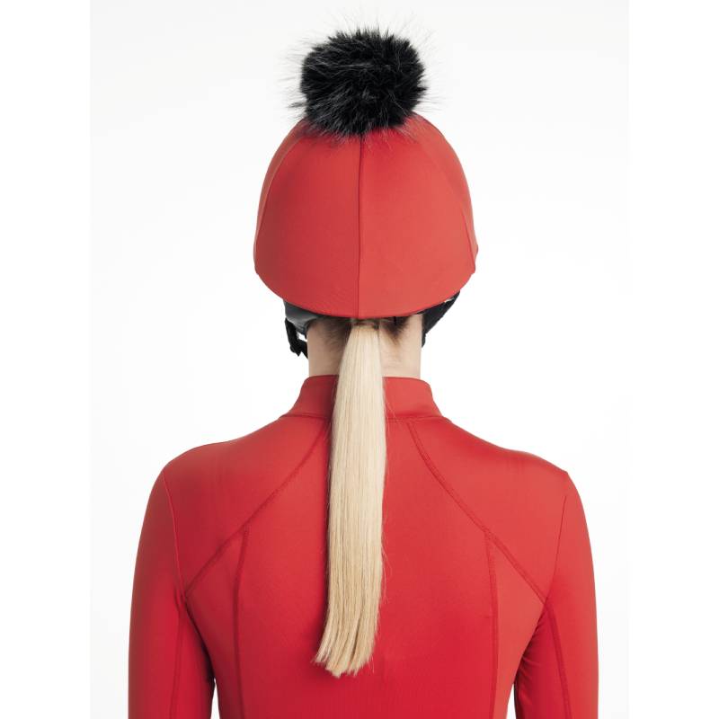 Person wearing the LeMieux Classique Pom Hat Silk Chilli, shown from the back.