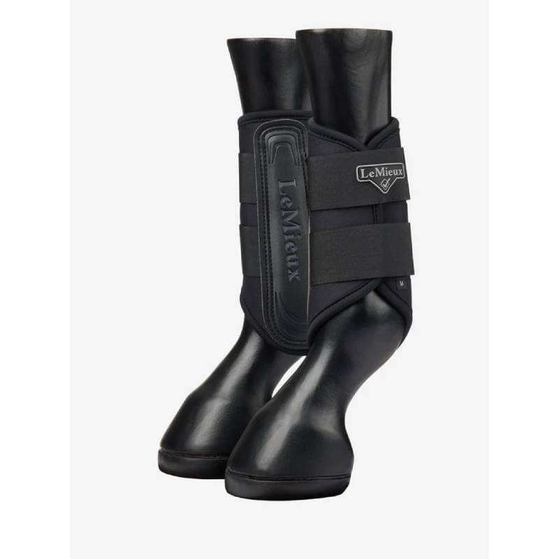 LeMieux Grafter Brushing Boots Black displayed with visible LeMieux branding on mannequins.