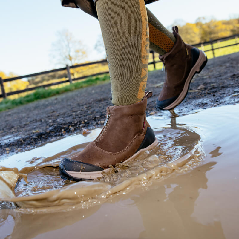LeMieux Trex Waterproof Zip Boots Brown keep you dry splashing in muddy puddles on the trail.