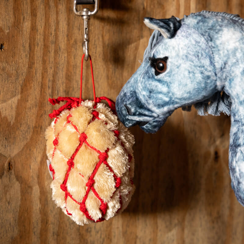 LeMieux Toy Pony Haynet Ember by LeMieux: a yellow mini hay bale in a red net for toy ponies.