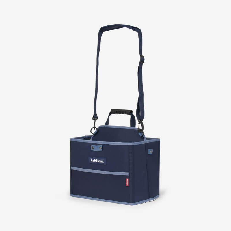 LeMieux Collapsible Storage Tote Navy with handle, strap, and front pocket.