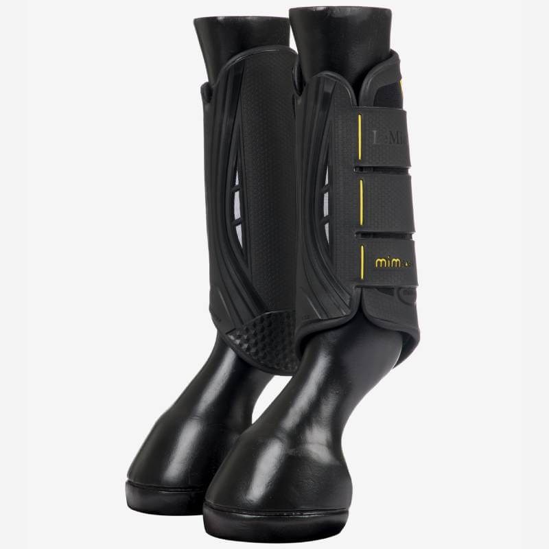 LeMieux MIMSafe Boot Hind Black—protective XC horse boot with yellow accents and velcro straps.