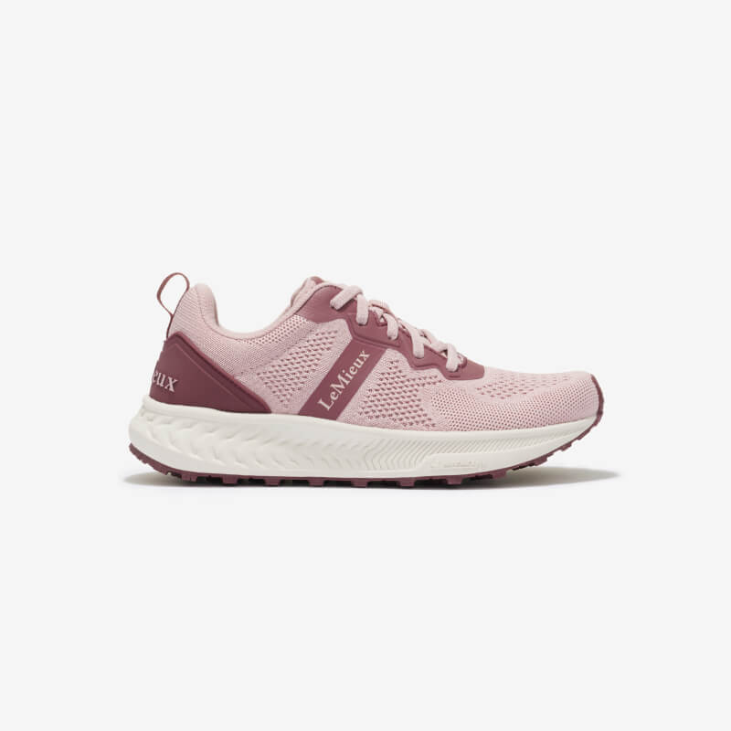 LeMieux Youth Trax-Lite Trainer Blossom with white Michelin sole on a plain background.