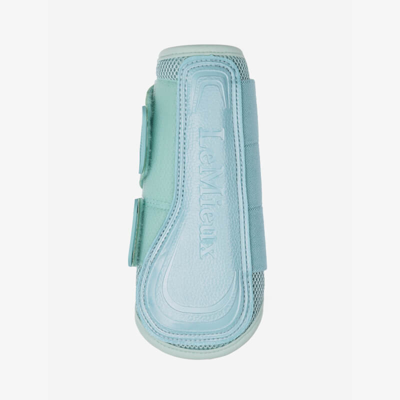 LeMieux Arika Mesh Brushing Boots in Aqua with velcro straps, front view.