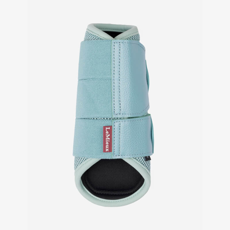 LeMieux Arika Mesh Brushing Boots Aqua with velcro straps and black lining.