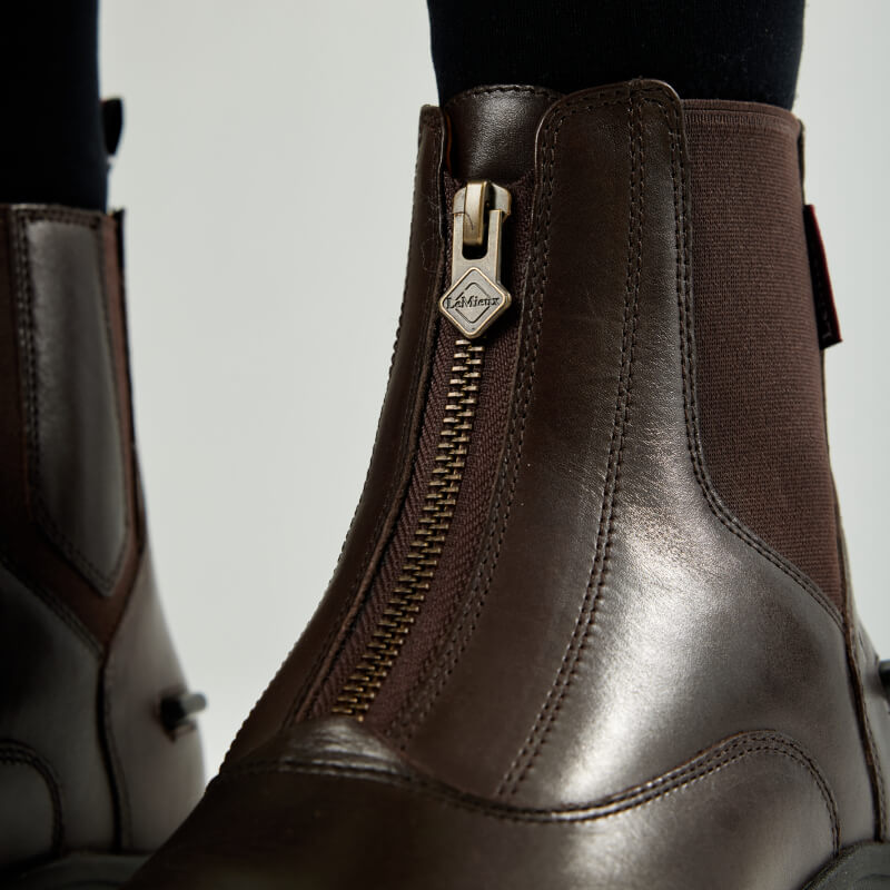 LeMieux Adults Zip Paddock Boot Brown features a front zipper and elastic side panels.