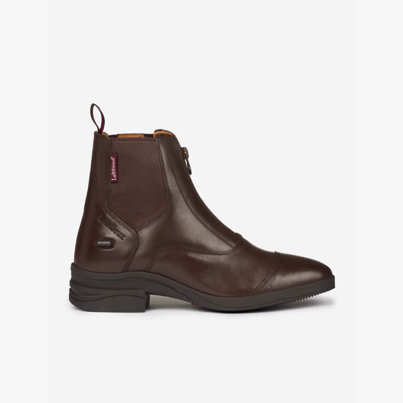 LeMieux Adults Zip Paddock Boot Brown features a side tag, zipper, and low heel, side view.