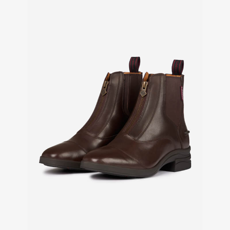 LeMieux Adults Zip Paddock Boot Brown with front zipper and low heel on a white background.