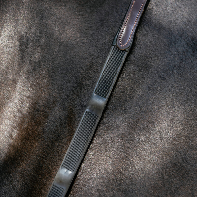 Two sets of LeMieux Ergo Grip Rubber Reins, brown, with textured grips and billet attachments.
