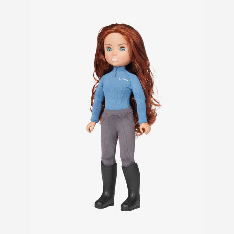 LeMieux Toy Rider Olivia doll with red hair, blue top, gray pants, and black boots.