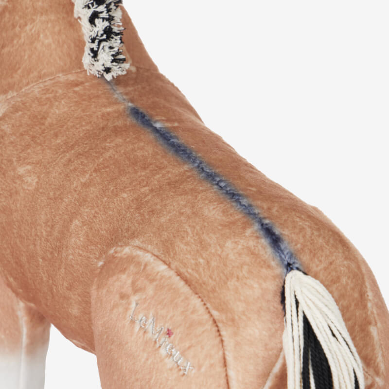 LeMieux Toy Pony Oskar: light brown plush horse with black hooves, white and black mane.