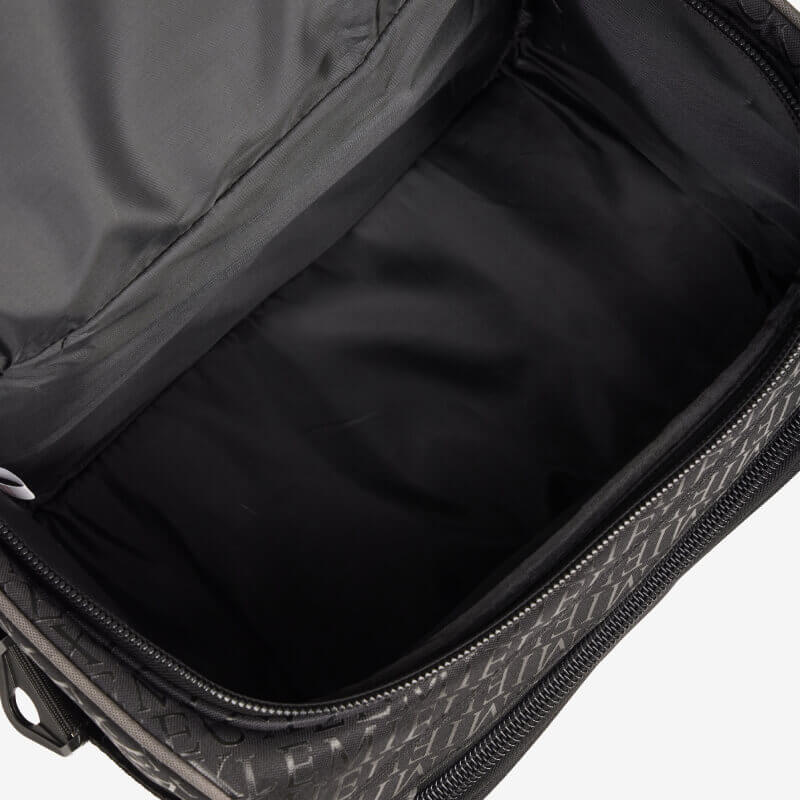 LeMieux Elite ProKit Lite Grooming Bag Black with fabric lining and zippered edge, top view.
