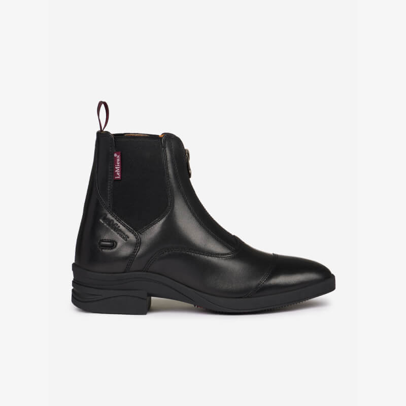 LeMieux Junior Zip Paddock Boot Black: kids’ black leather riding boots with side zip and elastic panel.