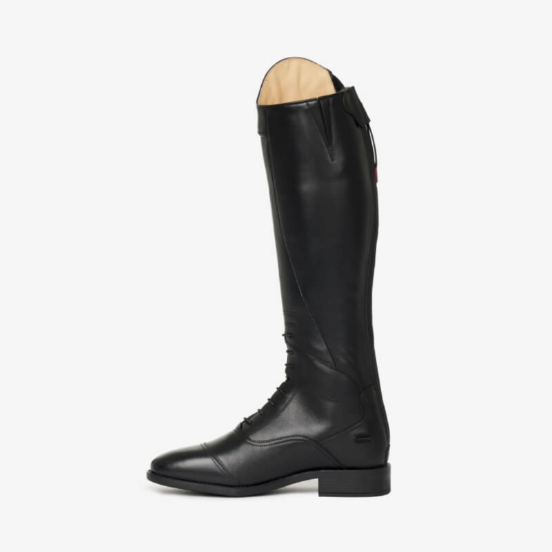 LeMieux Junior Field Riding Boot in black leather with a low heel, shown side-on.
