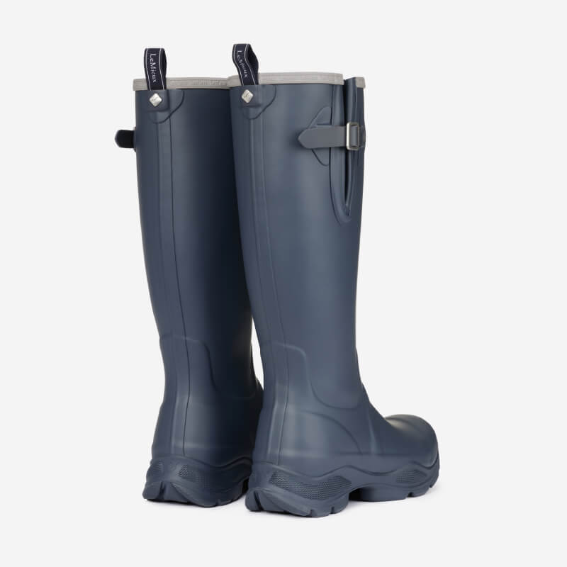LeMieux Ultra Stride Wellington Boots Navy: tall navy boots with side buckles, rear view.