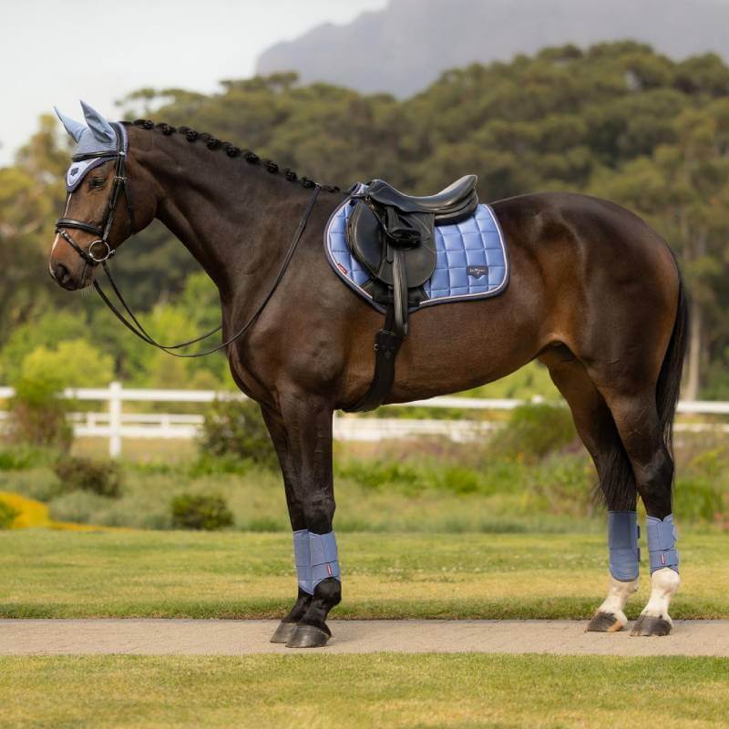 LeMieux Loire Close Contact Saddle Pad in powder blue with black details and bamboo lining.