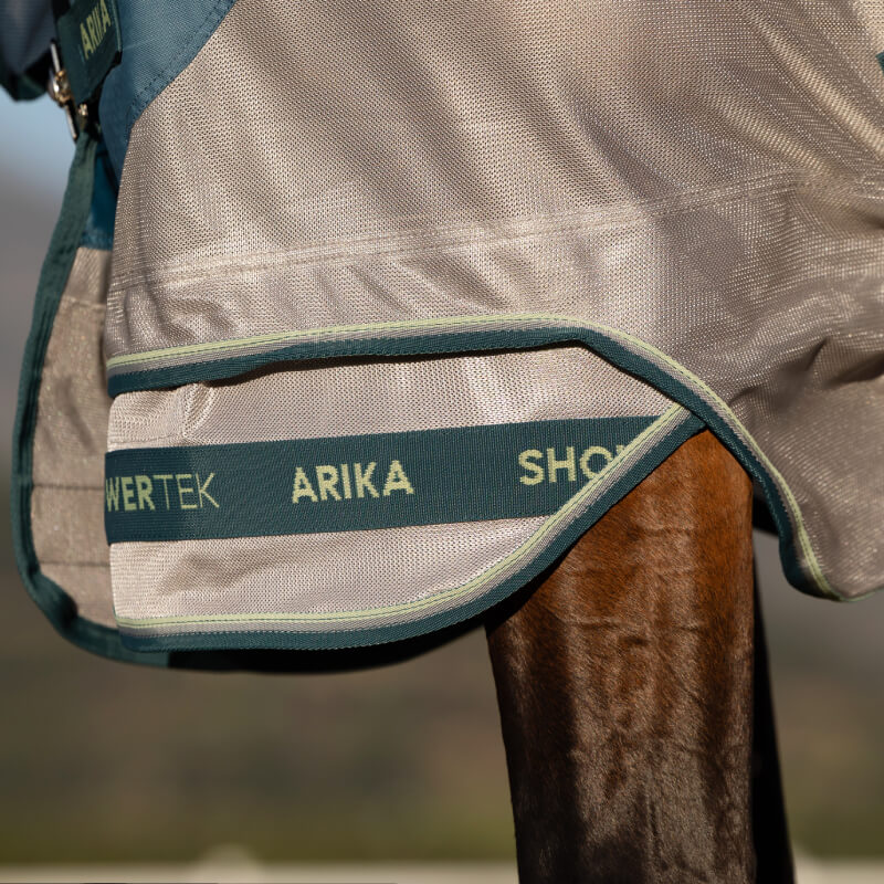 Close-up of a horse’s leg in a LeMieux Arika Camo Shower-Tek Fly Rug Jungle with UV protection.