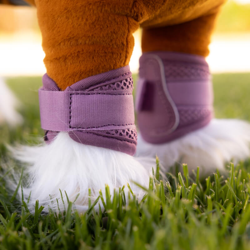 LeMieux Toy Pony Mesh Brushing Boots Mallow: pink mesh boots with Velcro, ideal for toy ponies.