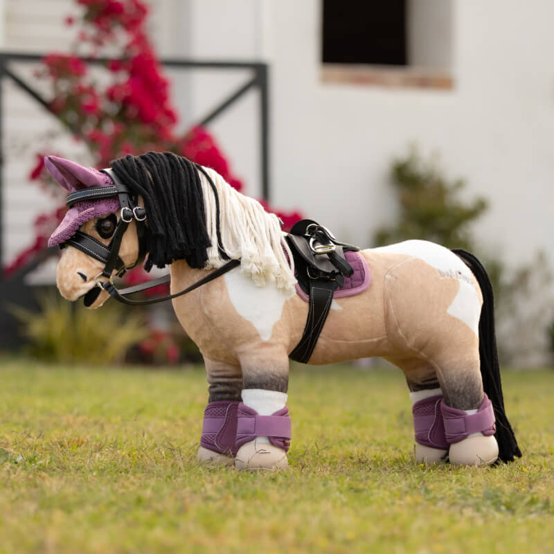 LeMieux Toy Pony Pad Mallow: purple quilted, pink trim, black patch on corner.