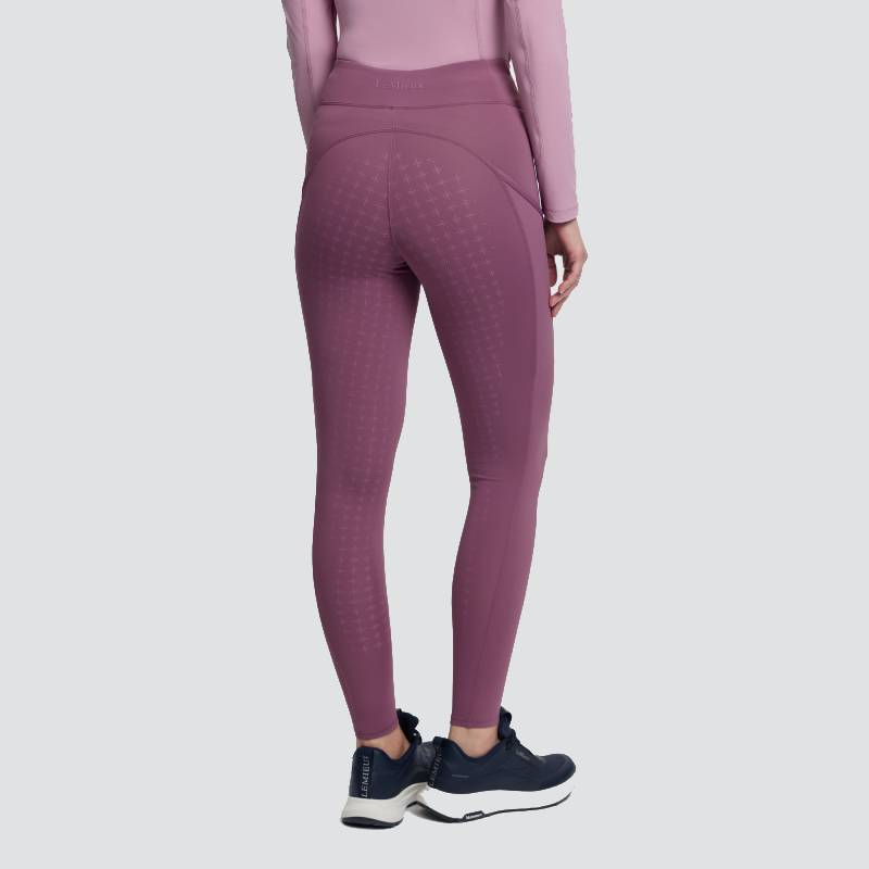 Person in LeMieux Naomi Pull On Breech Mallow & matching top, facing away, wearing black shoes.