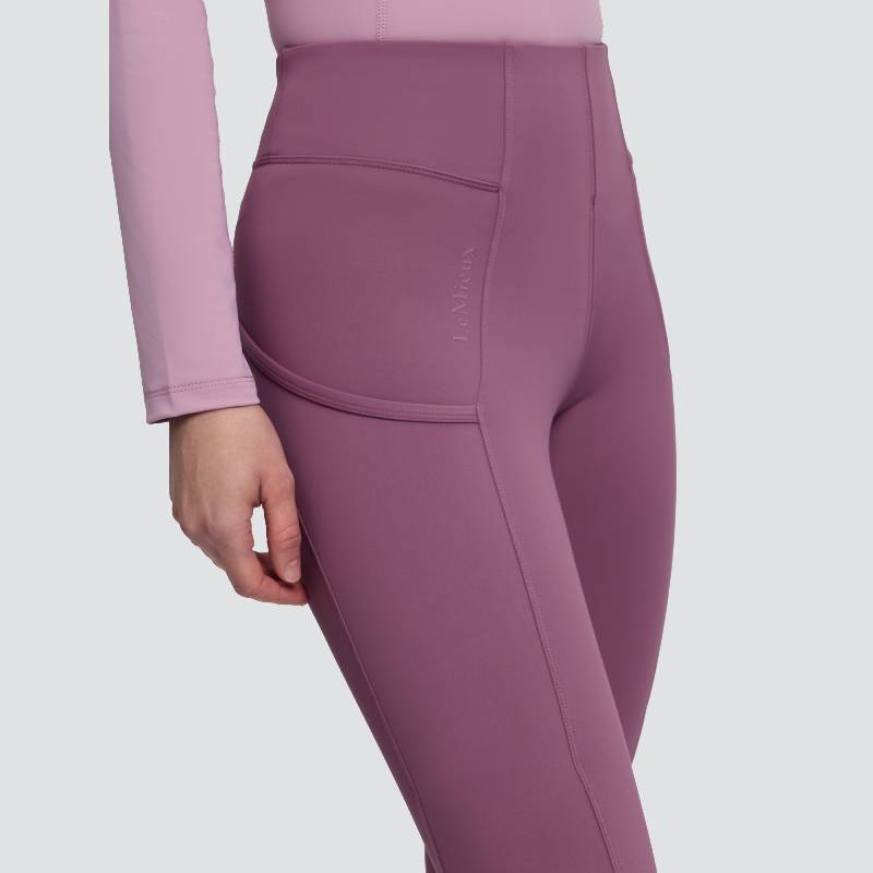 Person in LeMieux Naomi Pull On Breech Mallow with side pocket and matching long sleeve top.