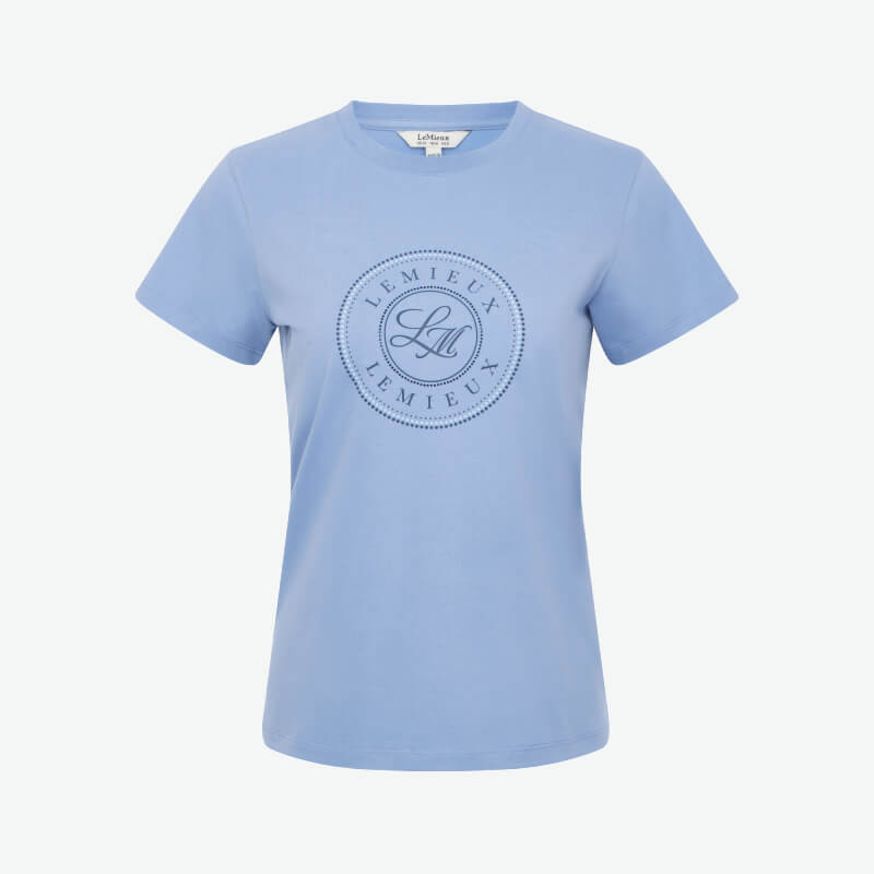 Woman in a LeMieux Classique T-Shirt Powder Blue, smiling against a white background.