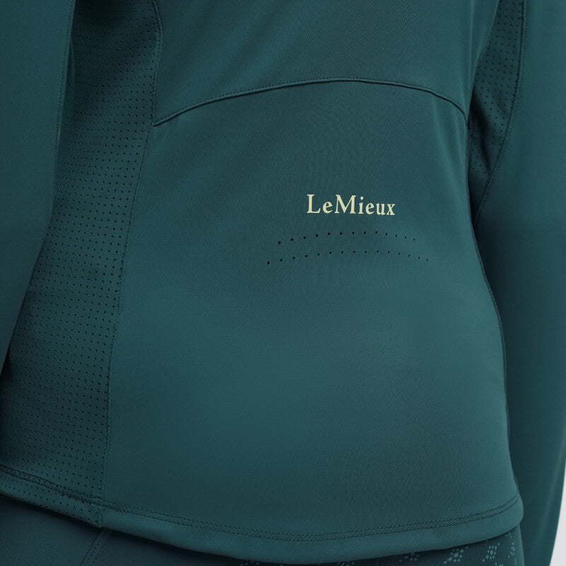 Close-up of LeMieux Young Rider Airflow Baselayer Jungle with breathable back fabric.