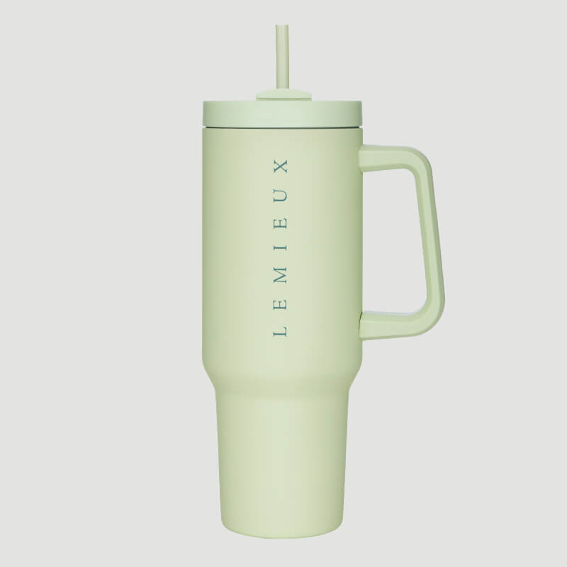 Light green LeMieux Sports Cup Macaron tumbler with handle, lid, straw; LEMIEUX written vertically.