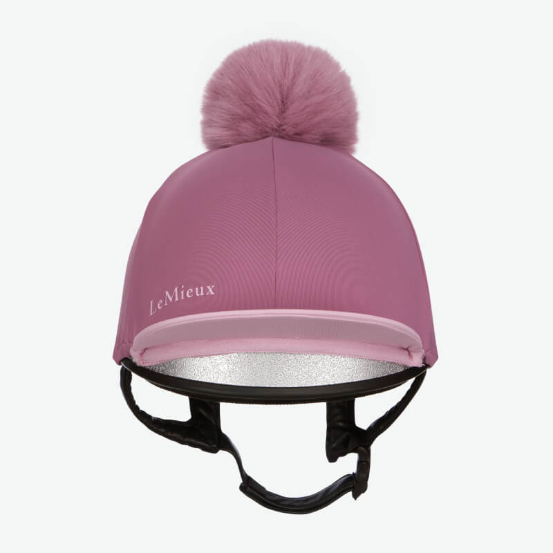 LeMieux Classique Pom Hat Silk Mallow: pink riding hat cover with pom and black strap.