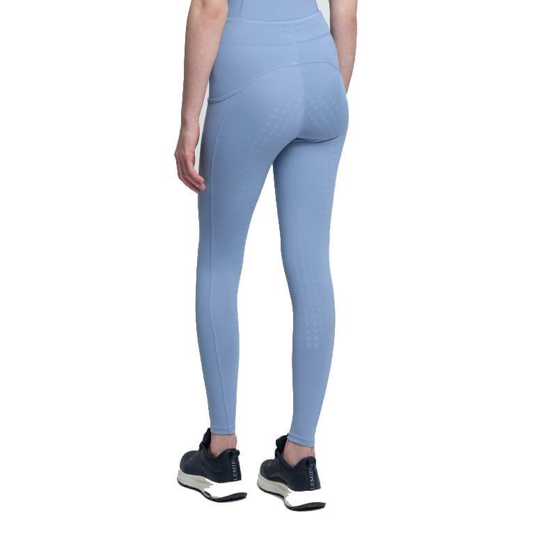 LeMieux Orla Pull On Breech in Powder Blue, styled with black sneakers, back view on white.