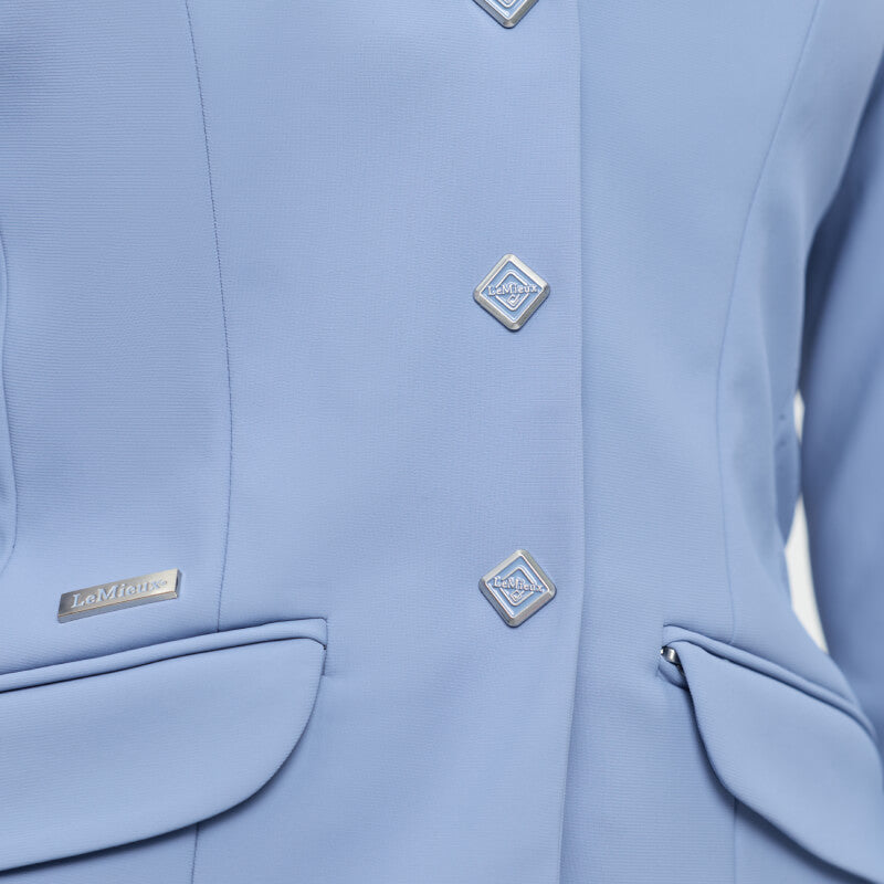LeMieux Young Rider Kennedy Show Jacket in powder blue with silver buttons and 2 pockets.