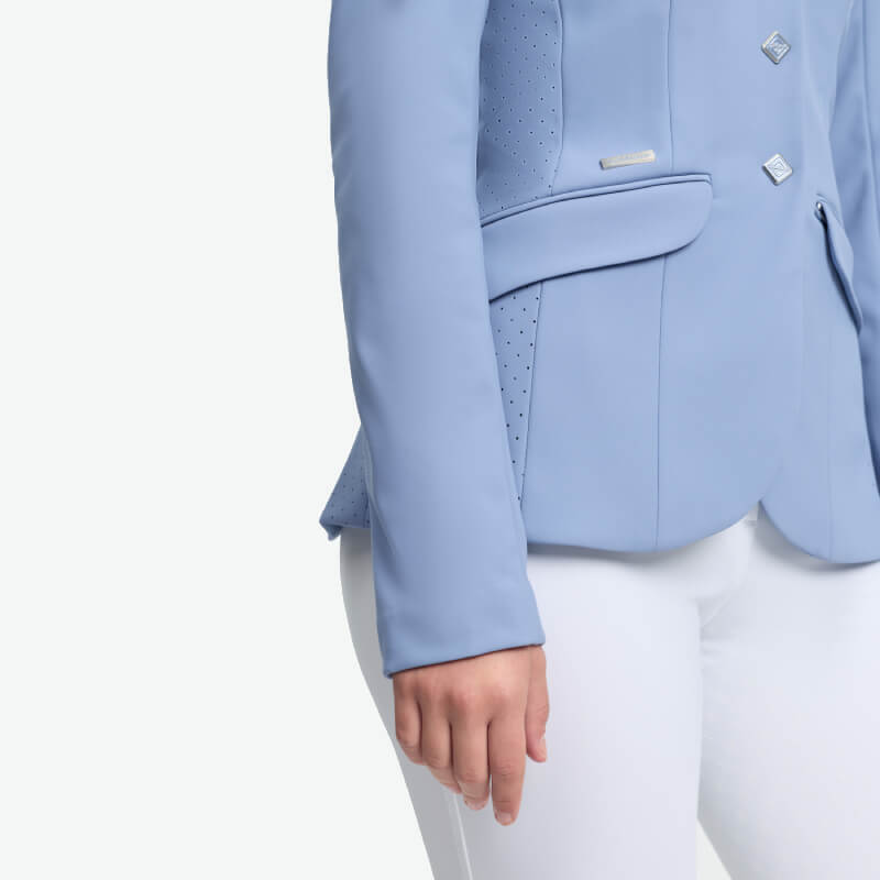 In LeMieux Young Rider Kennedy Show Jacket Powder Blue, shown from shoulders to hips.
