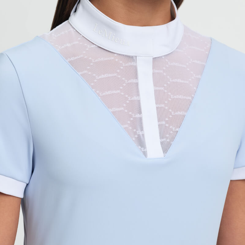 LeMieux Eva Show Shirt Mist: Short sleeve, light blue, white mesh V panel, breathable.