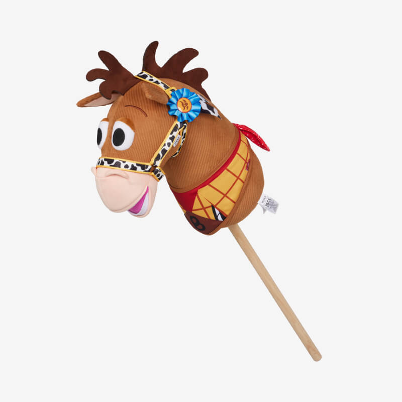 LeMieux Disney Hobby Horse Bullseye: brown stick horse toy with cartoon eyes and yellow bandana.